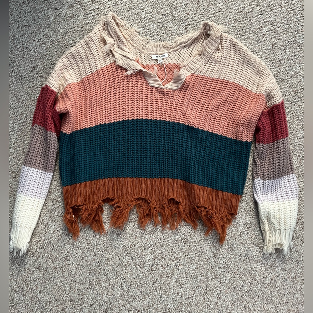 Distressed sweater